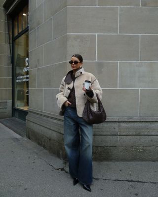 What to wear in November: @maryljean wears a shearling coat with wide-leg jeans and ankle boots