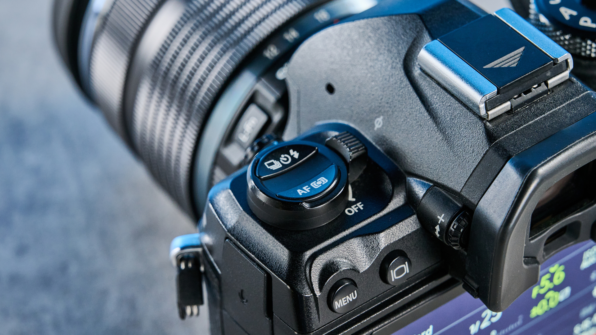 A black OM System OM-1 Mark II Micro Four Thirds mirrorless camera