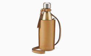Tan leather water bottle holder, by Smythson and S’well