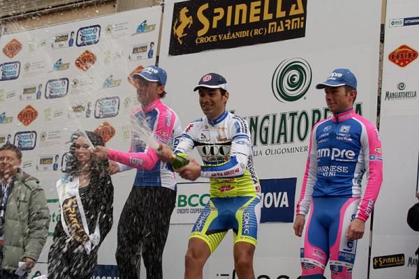 The top three stage finishers let loose the bubbly.