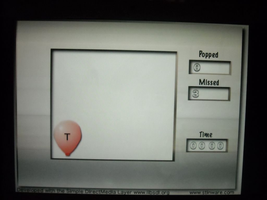 Balloon Typer users type letters as they appear to pop balloons.