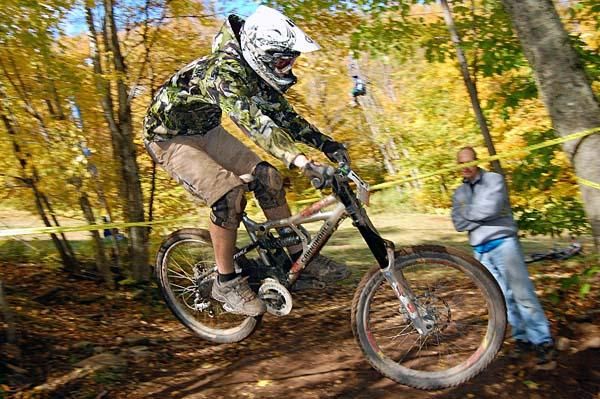 A camo-type top might make this rider blend into the wooded background.