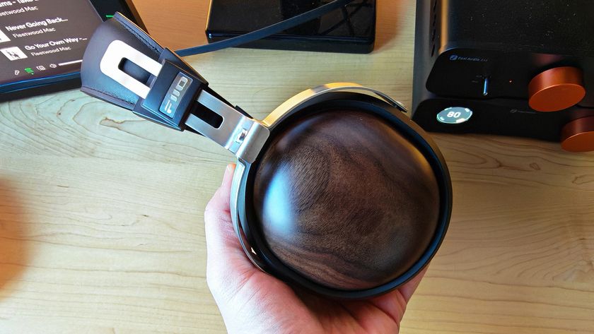 Various photos of the FiiO FT1 headphones, in a home office. 