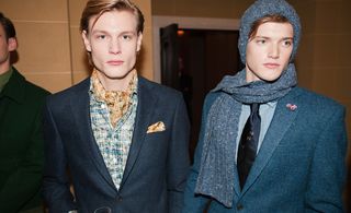 Models wear scarf as neck-accessory - chunky, or very delicate, in printed silk.