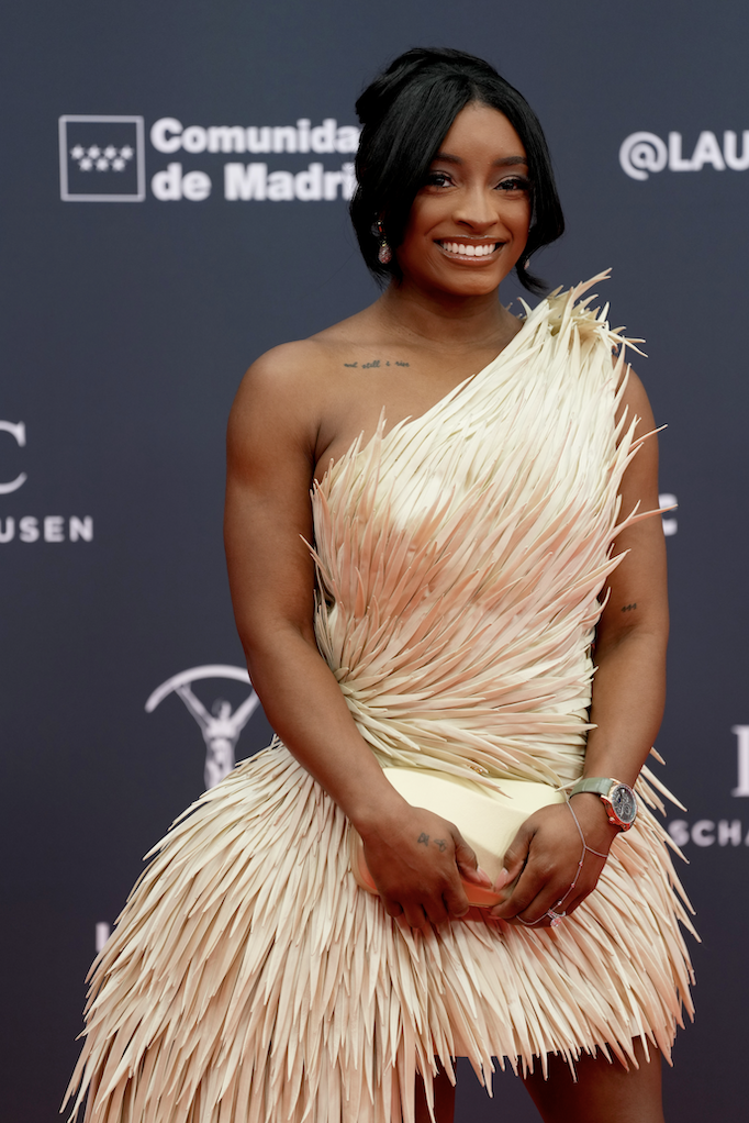 Simone Biles wore a feather high-low dress on the World Sports Awards 2026 red carpet