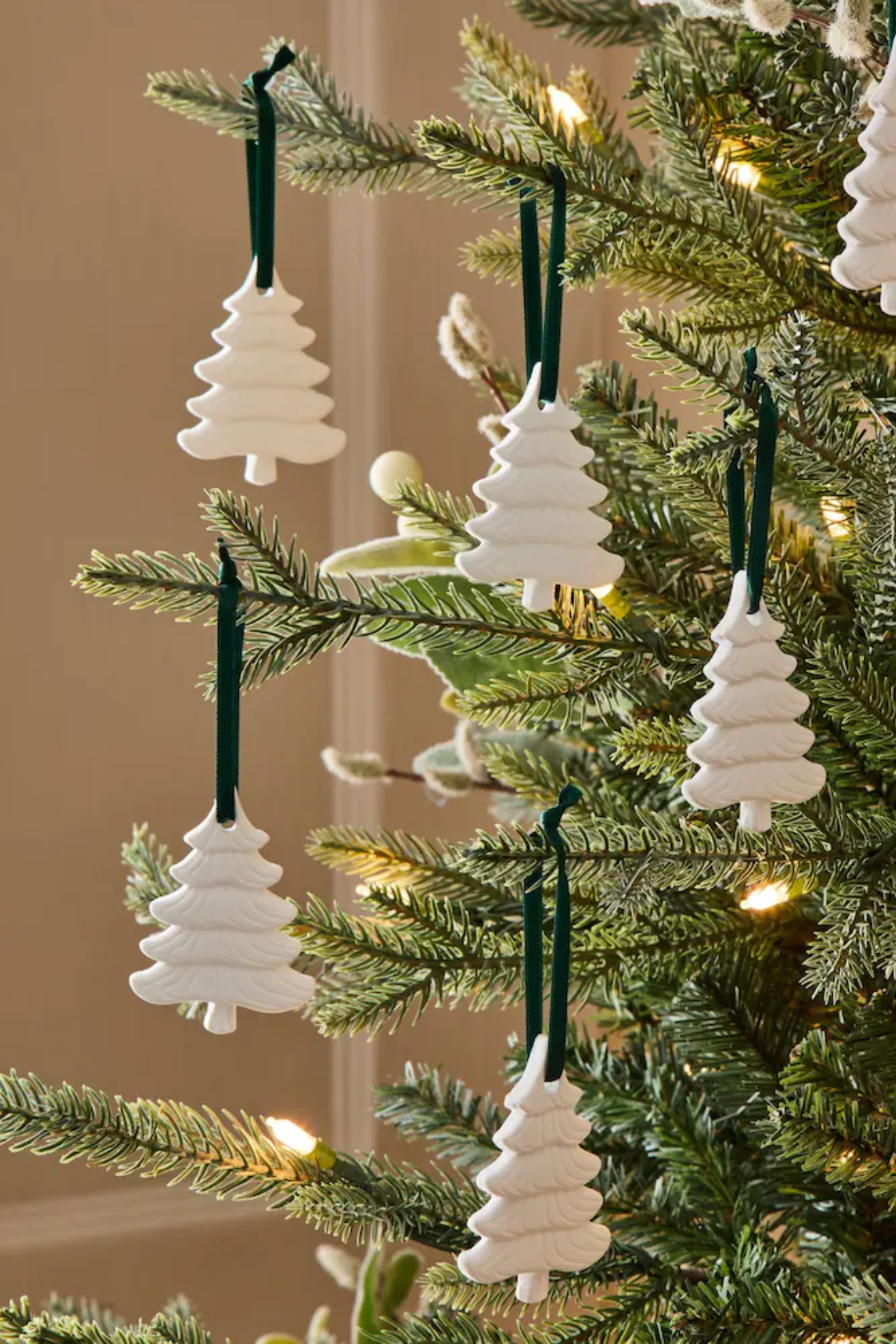 A close-up of a tree with tree-shaped scented ornaments