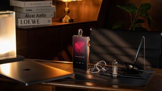 Astell & Kern SP4000T portable music player with a red display