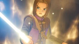 The hero holding a glowing sword during one of the best Dragon Quest games of all time, Dragon Quest 11: Echoes of an Elusive Age
