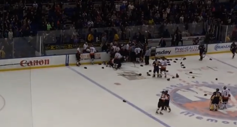 Watch NYC cops and firefighters pummel each other at a charity hockey game