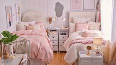Bedroom with two pink beds