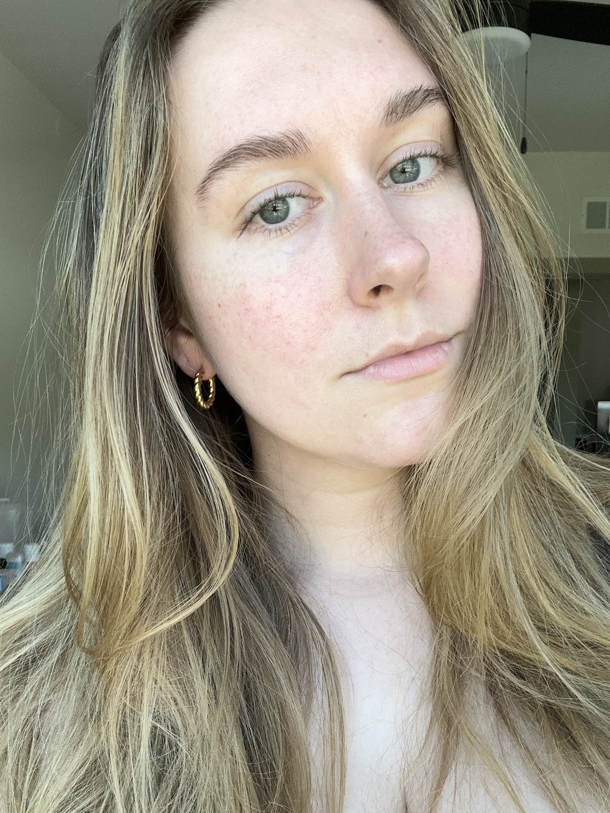 Beauty editor Kaitlyn McLintock before using ESW Beauty sheet mask.