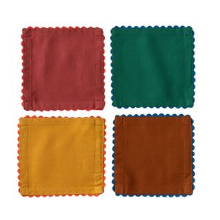 A set of four Christmas colored napkins