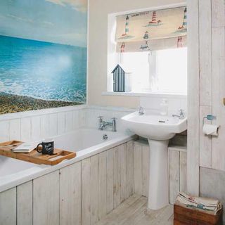 bathroom with wooden beach hut and sink unit