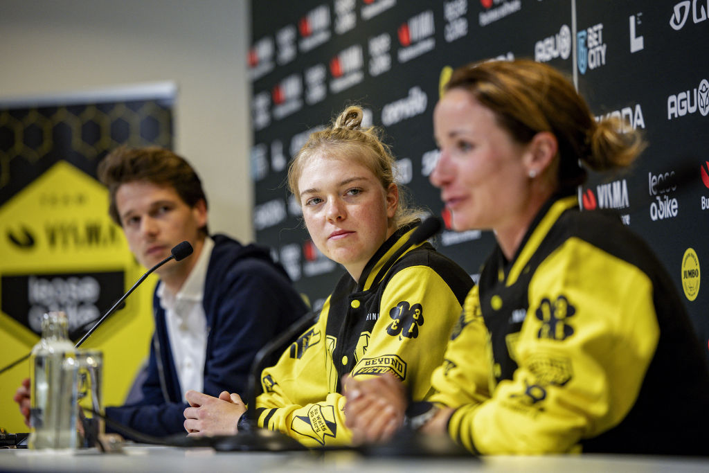 Team Visma-Lease a Bike's Dutch rider Fev Van Empel (C) and Team Visma-Lease a Bike's Dutch rider Marianne Vos (R) address media during a press conference of the Visma - Lease a Bike cycling team ahead of the Tour of Flanders cycling race, in Ghent on March 29, 2024. The 108th edition of the Tour of Flanders cycling race will take place on March 31, 2024. (Photo by DAVID PINTENS / Belga / AFP) / Belgium OUT