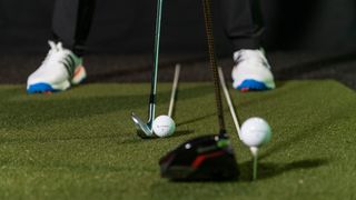 The difference between the ball position of an iron vs a driver