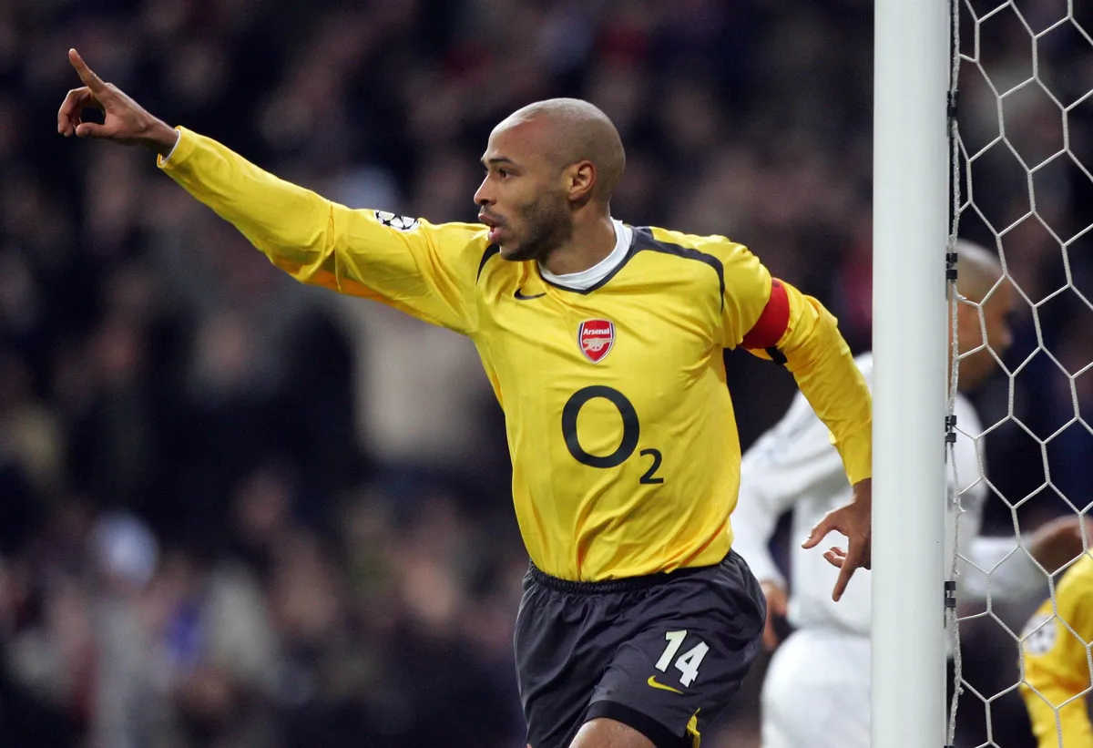Thierry Henry celebrates after scoring for Arsenal during the Champions League last 16 match against Real Madrid at the Santiago Bernabeu in Madrid, Spain on 21 February, 2006.