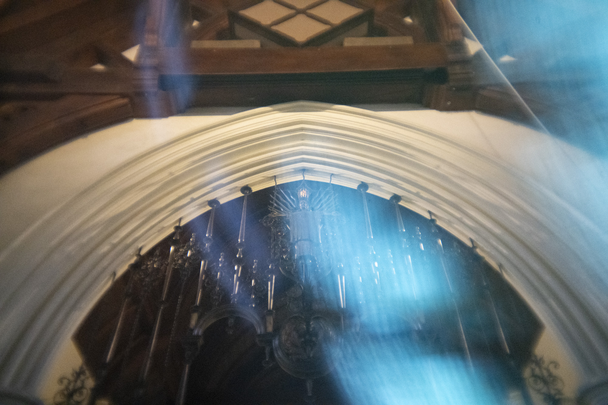 The arches to an altar inside an old Anglican church in the UK