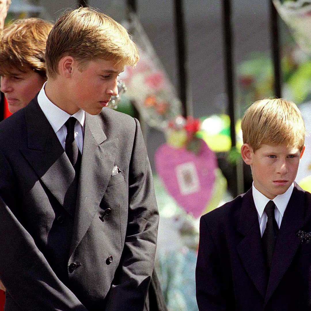 Prince William and Prince Harry in suits at their mother's funeral