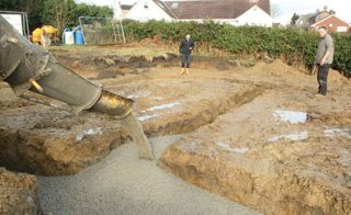 Building foundations being poured on site 