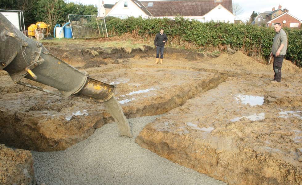 Building foundations being poured on site 