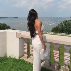 A woman outside on the balcony