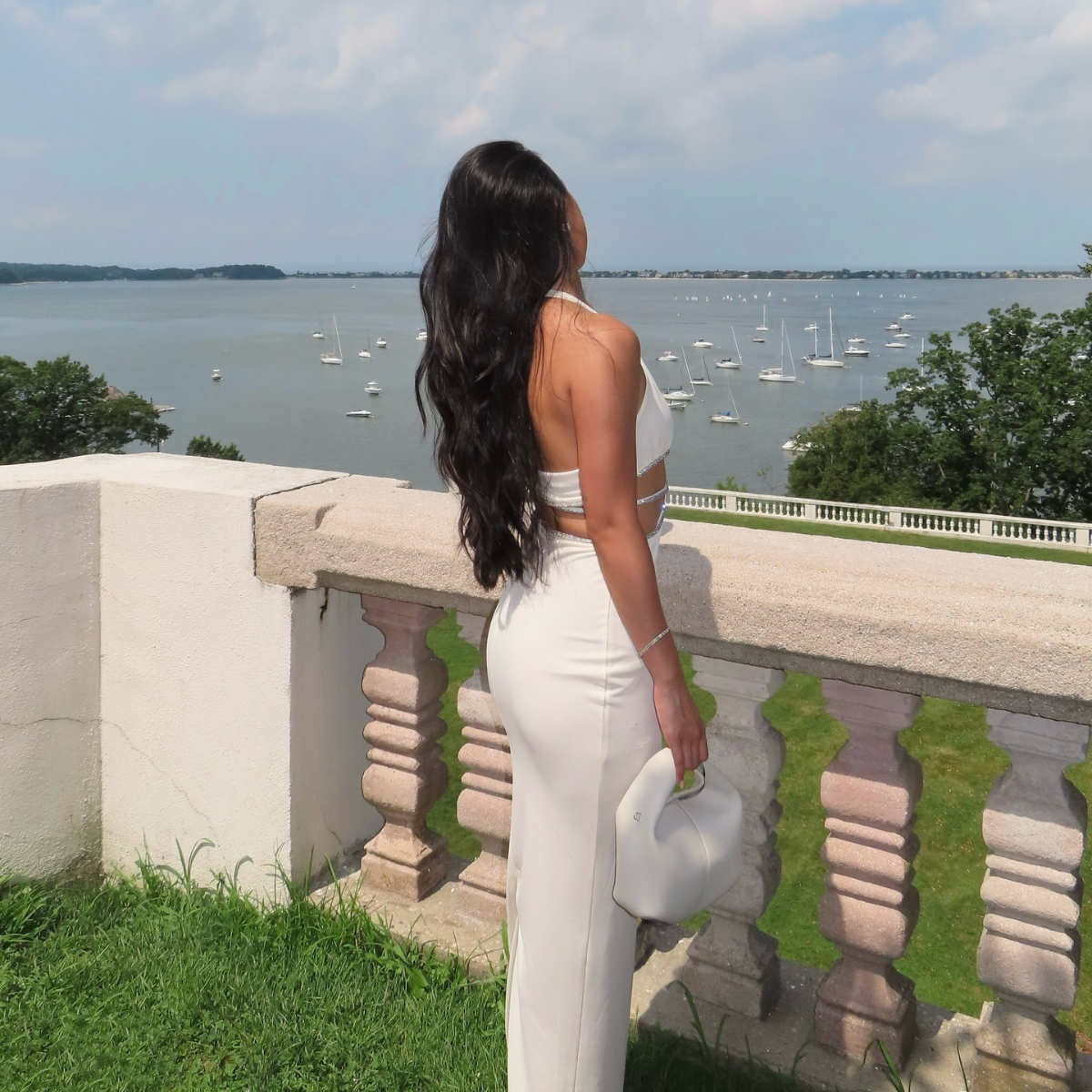A woman outside on the balcony