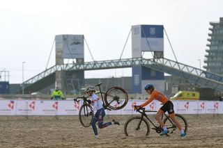 OOSTENDE BELGIUM JANUARY 31 Aniek Van Alphen of The Netherlands and Josie Nelson of United Kingdom Sand during the 72nd UCI CycloCross World Championships Oostende 2021 Women U23 UCICX CXWorldCup Ostend2021 CX on January 31 2021 in Oostende Belgium Photo by Luc ClaessenGetty Images