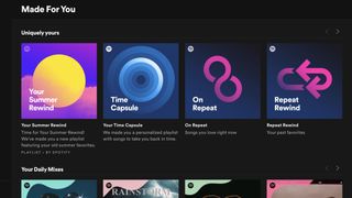 The spotify interface on a computer showing personalised playlists, like time capsule and your summer rewind.