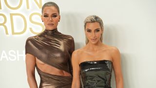 Kim Kardashian and Khloe Kardashian supporting SKKN.