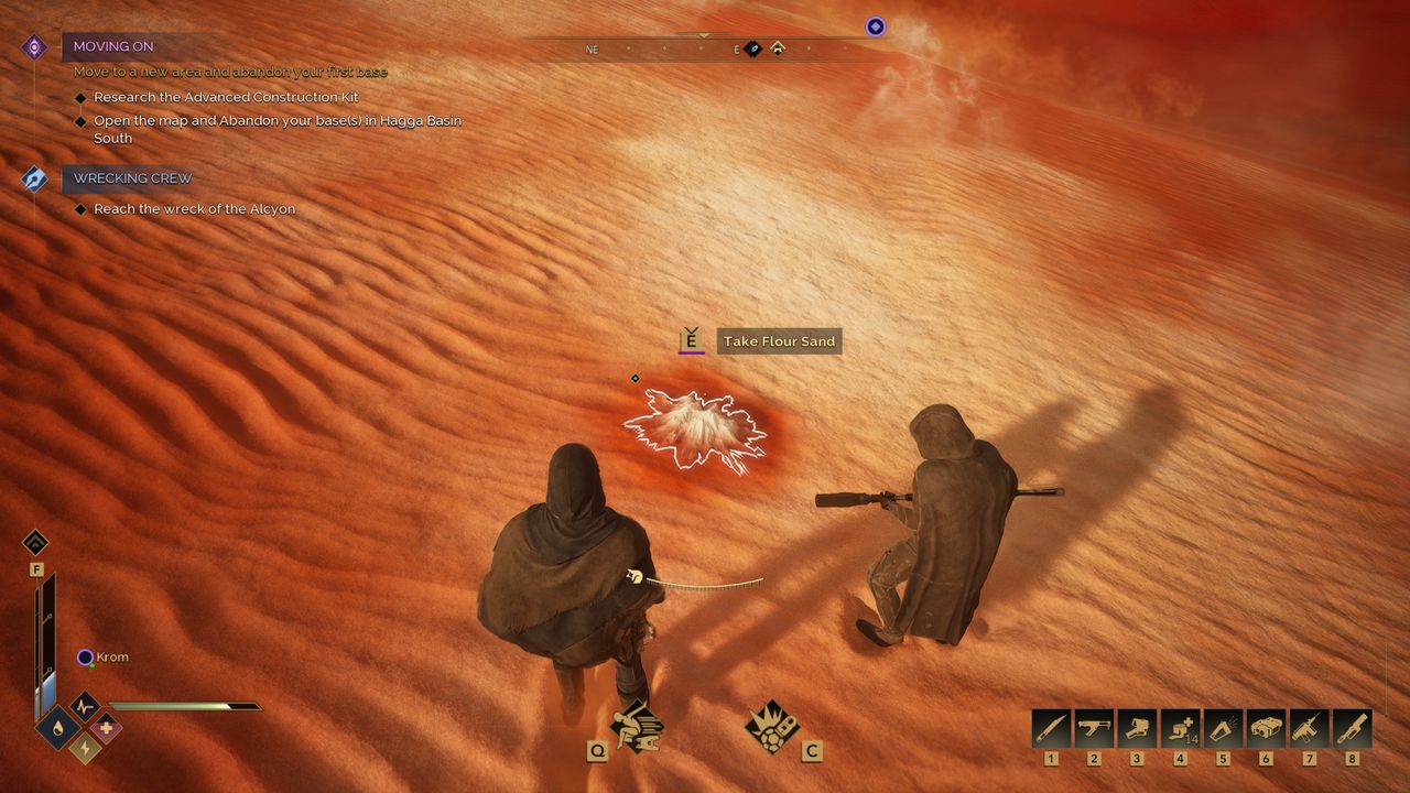 Dune: Awakening flour sand location - Two players looking at a pile of flour sand gathered on the ground.