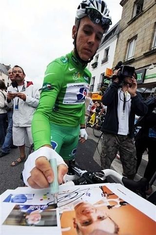 Philippe Gilbert (Française des Jeux) signing autographs at the Tour de France