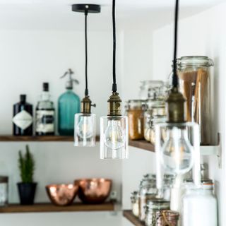 kitchen with wooden shelf and lights