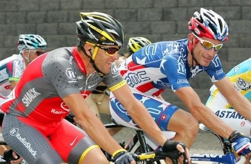 Old friends Lance Armstrong and George Hincapie share a joke.