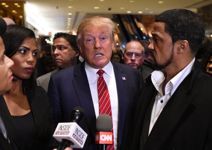 Donald Trump meets with prominent African American clerics, including Rev. Darrell Scott (right), in New York City in November 2015.