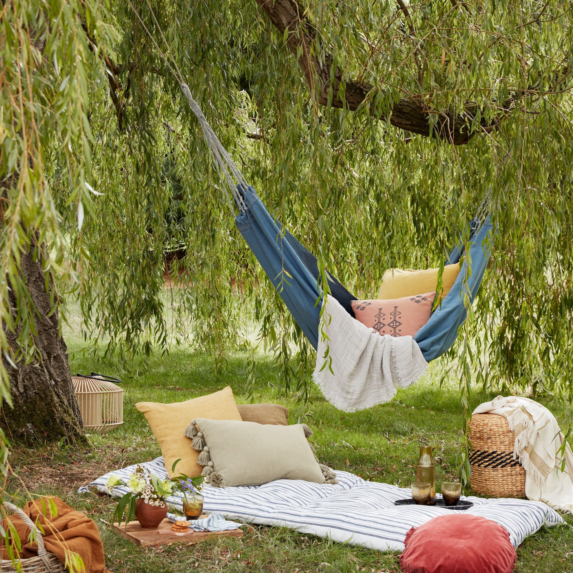hammock swing with garden and pillows