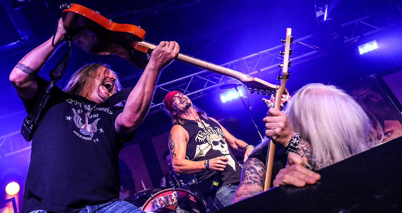 (from left) Pete Evick, Bret Michaels ,and Eric Brittingham perform in concert at Mulcahy's Pub and Concert Hall in Wantagh, New York on August 11, 2017