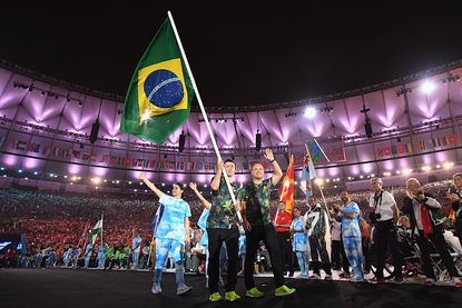 Athletes from Brazil participate in the Paralympics closing ceremony.