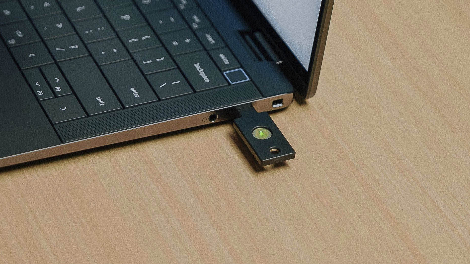 A Yubikey plugged into a laptop