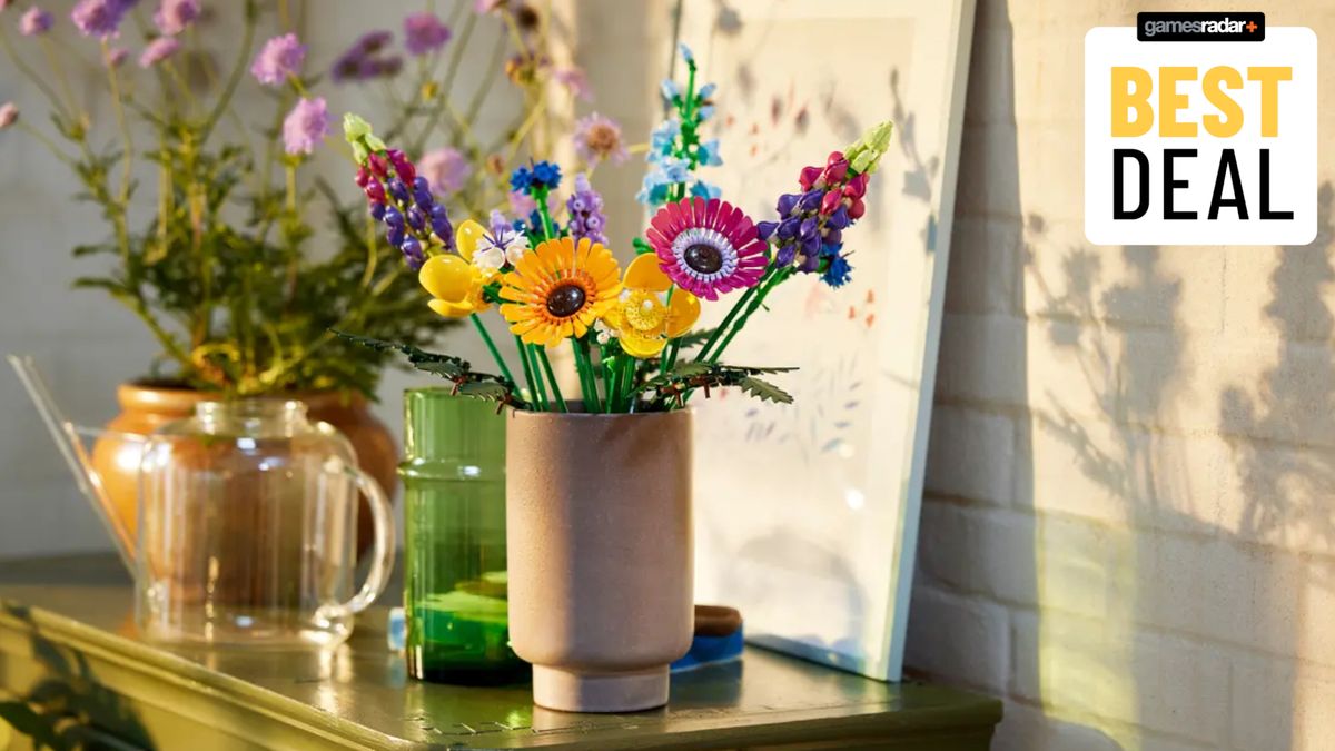 The Lego Wildflower Bouquet set, in a vase on a shelf