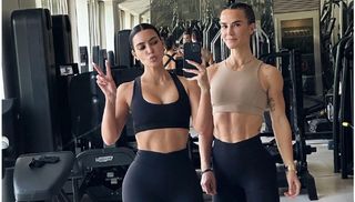Kim Kardashian next to Senada Greca in the gym