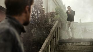 Chris Evans' Lloyd Hansen holds Ryan Gosling's Sierra Six at gunpoint in Netflix's The Gray Man