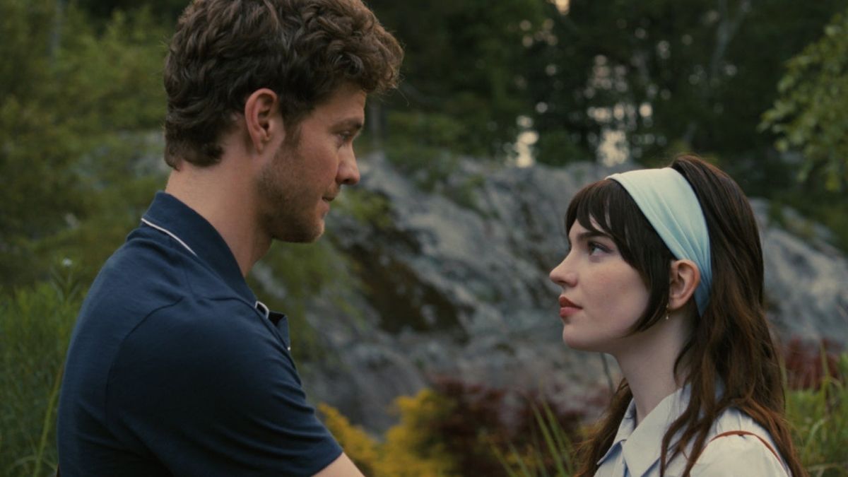 Josh and Iris staring at each other in an outdoor location in Warner Bros&#039; Companion, one of January&#039;s new movies