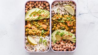 Tray of vegan food including chickpeas and vegetables