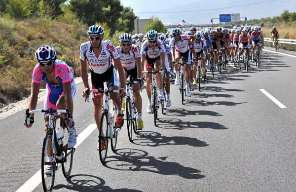 Lampre - Farnese Vini and Omega Pharma - Lotto riders contribute to the pace making in the peloton.