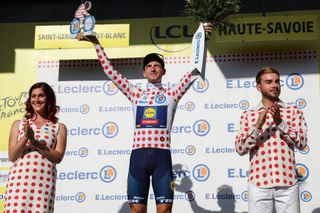 Lidl - Trek's Italian rider Giulio Ciccone celebrates on the podium with the best climber's polka dot (dotted) jersey after the 15th stage of the 110th edition of the Tour de France cycling race, 179 km between Les Gets Les Portes du Soleil and Saint-Gervais Mont-Blanc, in the French Alps, on July 16, 2023. (Photo by Thomas SAMSON / AFP)