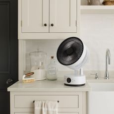 Meaco Sefte Pro table top air circulator on a kitchen side next to a butler sink