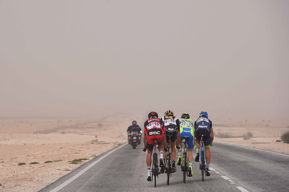 The early leaders alone in the desert landscape.