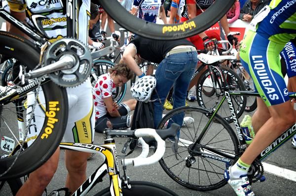 Heinrich Haussler, in dots, picks himself up off the tarmac amidst the chaos.