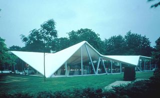 Triangular-roofed structure with glass facade