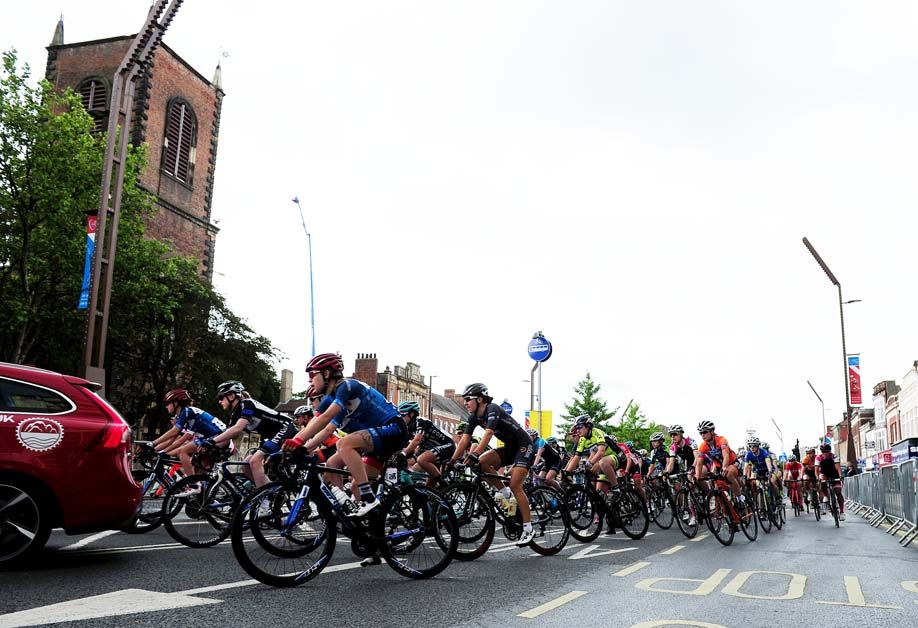 The peloton passes through